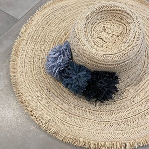 San Diego Hat Company straw floppy hat with blue raffia pom pom embellishment